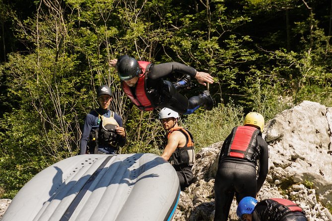 Adventure Rafting with Photo Service in Bovec - Swimming, raft slides, and the optional rock jump
