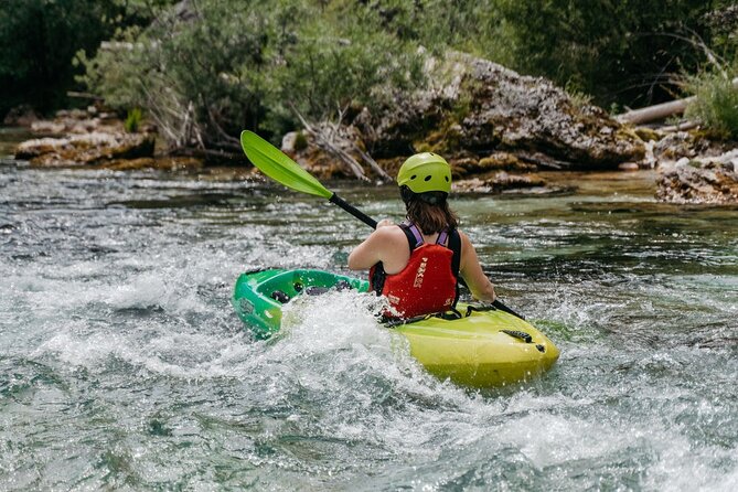 Best Guided Kayaking Tour in Soča Valley With Photos - Learning to steer through the Soča