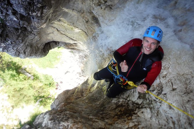 Canyoning In The Triglav National Park - Rappelling beside the Parabola waterfall