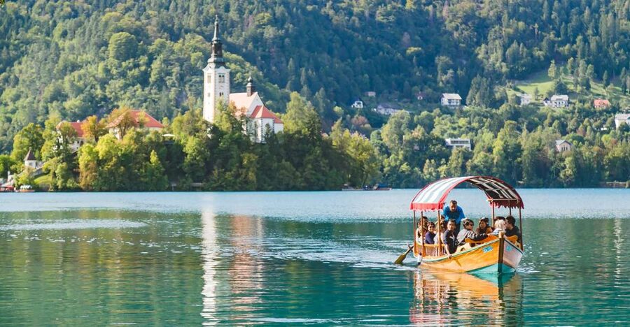 From Ljubljana: Lake Bled and Bled Castle Tour - Arriving at Lake Bled below the Julian Alps