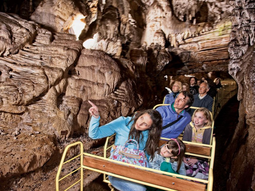 From Ljubljana: Postojna Cave & Predjama Castle Half-Day - Inside Postojna Cave by electric train