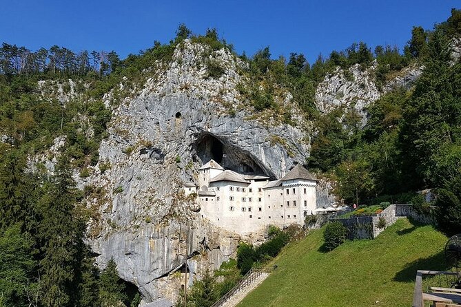 Ljubljana: Postojna cave & Predjama castle small group tour - Entering Postojna Cave by train