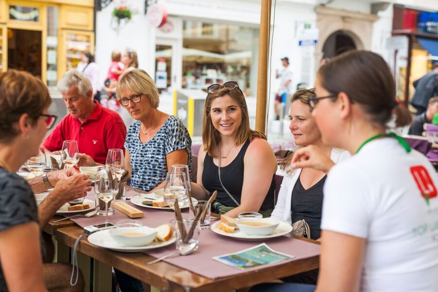 Ljubljana: Slovenian Cuisine Walking Tour with Tastings - Starting beside the Triple Bridge
