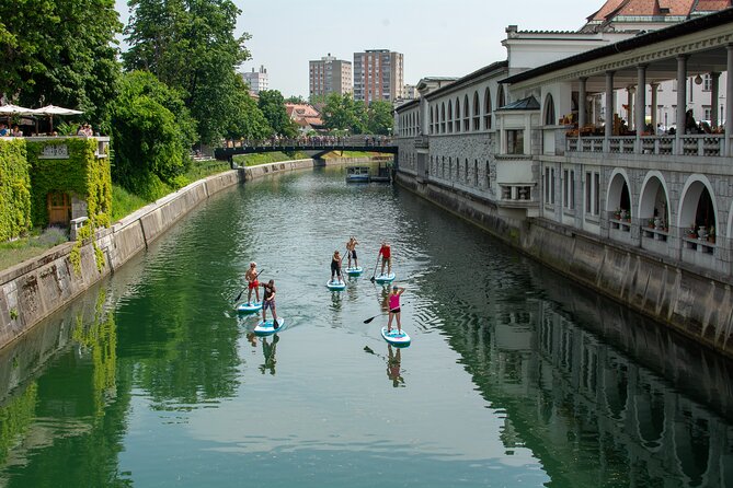 Ljubljana Stand-Up Paddle Boarding Lesson and Tour - Ljubljana Castle above the rooftops
