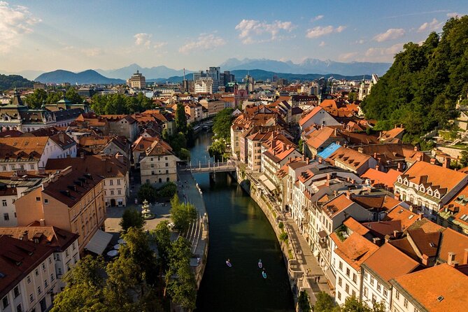 Ljubljana Stand-Up Paddle Boarding Lesson and Tour - Triple Bridge from the water