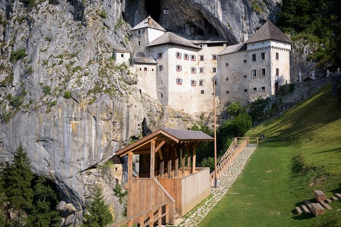 Postojna Cave & Photostop Predjama castle - Group Tour from Koper - Entering Postojna Cave by electric train
