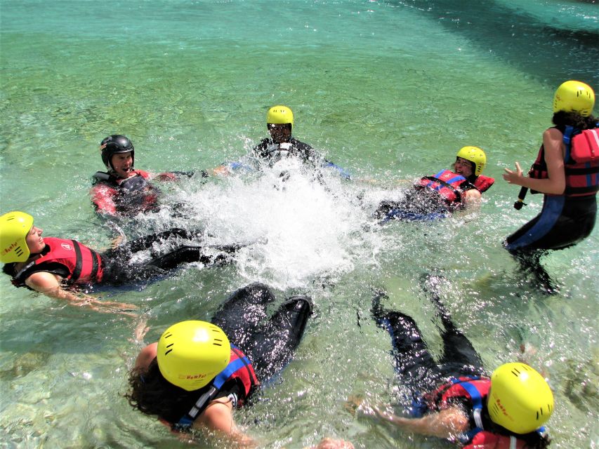 Slovenia: Half-Day Rafting Tour on Soča River with Photos - Ninety minutes of rapids, pools, and mountain views