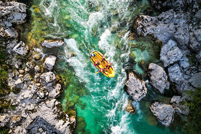 Whitewater Rafting on Soča River – Local Experts Since 1989 - Scenery from the raft, including Boka Waterfall