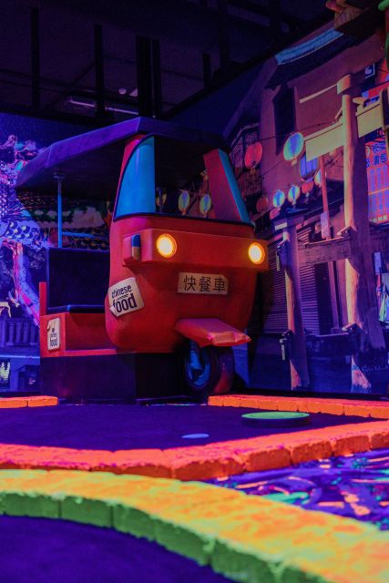 Woop! Glow golf: Ljubljana Btc City - A neon trip through four parts of the world